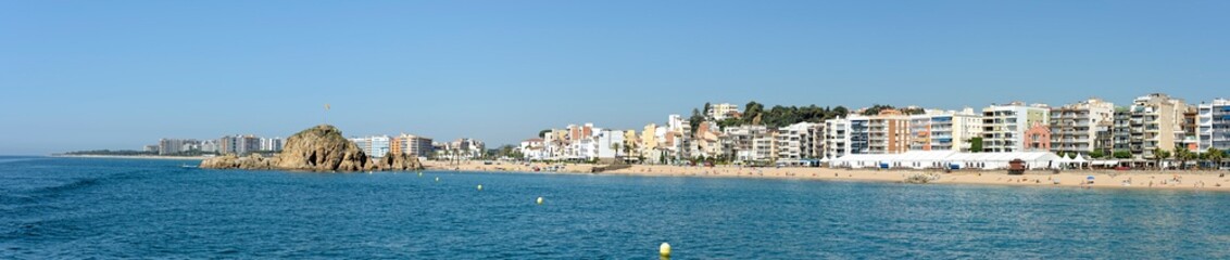 Fototapeta na wymiar Coastline with Blanes beach towards Sa Palomera Rock, Catalonia.