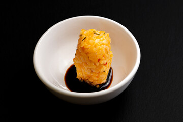 Carrot rice nigiri sushi with soy sauce