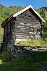Otternes, Norway - June 19, 2022: Otternes, a Norwegian linear and cluster collective farmyard...