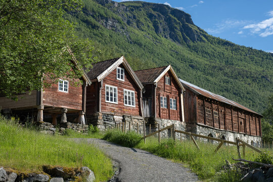 Otternes, Norway - June 19, 2022: Otternes, a Norwegian linear and cluster collective farmyard midway between Aurland and Flam. Vestland county. The farmyard consists of 27 buildings. Selective focus