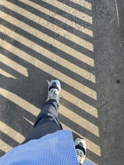 pedestrian crossing the street