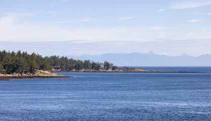 Canadian Landscape by the ocean and mountains. Summer Season.