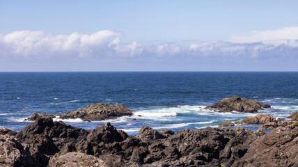 Fototapeta na wymiar Rugged Rocks on a rocky shore on the West Coast of Pacific Ocean.