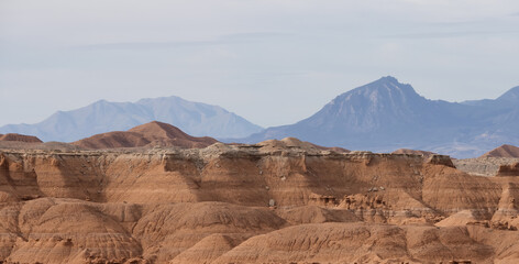 Red Rock Formations and Hoodoos in the Desert at Sunrise.