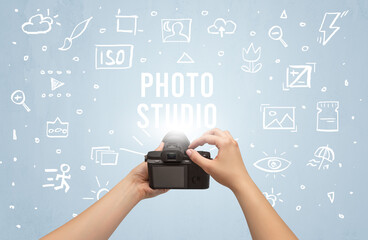 Hand taking picture with digital camera