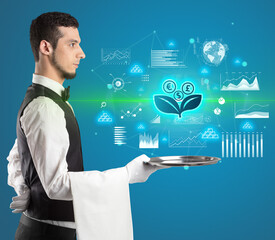 Handsome young waiter in tuxedo holding currency icons on tray