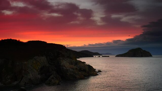 Seascape at sunset. Mediterranean sea and rocky coast in the evening. Cabo de Moras landscape in Galicia Spain.