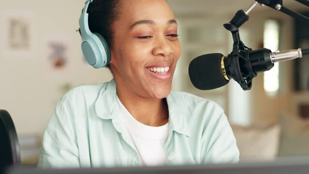 Podcast, radio and report with a woman recording or live streaming content with a microphone and headphones. Influencer, reporter or journalist talking on air and broadcasting the news online