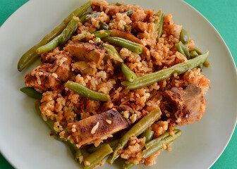 Peri Peri chicken with tomato rice and green beans