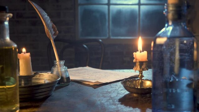 18th century scene with candles and quill pen