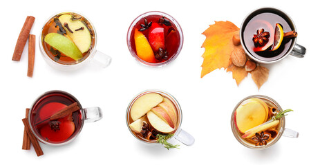 Set of delicious mulled wine isolated on white, top view