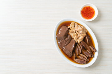 stewed duck offal in brown soup