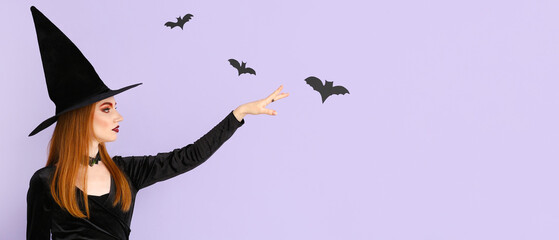 Beautiful woman dressed as witch for Halloween on lilac background