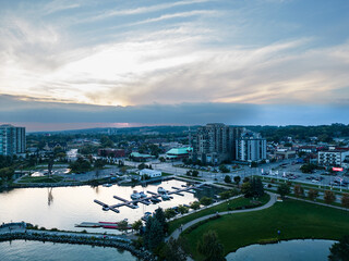 Downtown Barrie Drone shots of park boat yard and buildings at sunset 