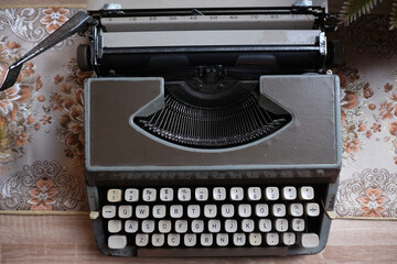 vintage typewriter on the wood table with copy space