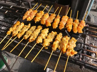 Pork satay grill in charcoal stove