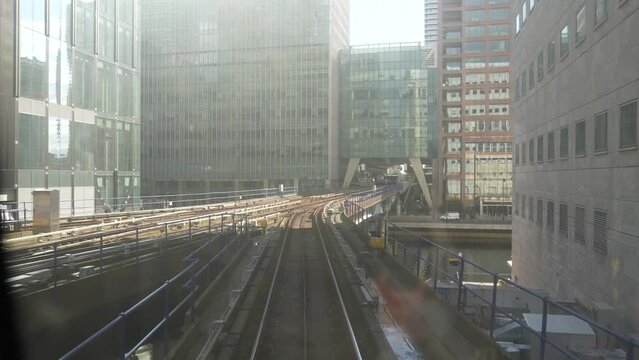 Canary Wharf London England September 2022 rear view of DLR train as it comes into Canary Wharf station