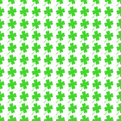 Seamless pattern with little four leaf clovers. Clover sign symbol pattern. Simple Repeatable design with Green clover on a White Background. Good luck symbol of Ireland.