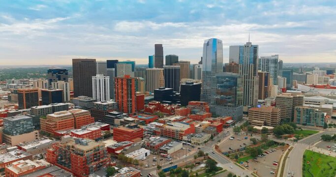 Beautiful sight of Denver downtown with varied skyscrapers. Vast scenery of the metropolis on cloudy day. Top view.