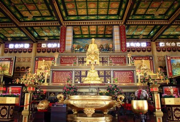 Fototapeta na wymiar Golden Buddha and the king of Vietnam on 23 Oct 2016 - Vietnam. Dai Nam is also called Tu An Temple (Temple of Four Gratitude), a reminder of the origins of the Vietnamese.