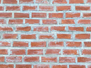 Old brick block concrete grunge wall texture background. Brown vintage brick wall close up 