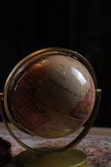 globe on a wooden table