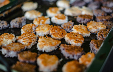 Pastry made from flour Coconut and sugar and then fried, called Khanom Ba Bin, sold at the Ban Na Kluea Fresh Market, Pattaya, Thailand.