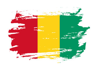 Obraz premium Grunge style textured flag of Guinea country