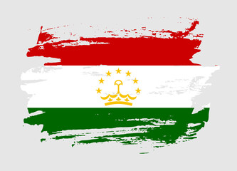 Obraz premium Grunge style textured flag of Tajikistan country