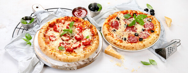 Freshly baked pizza on dark background.