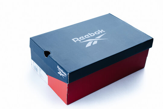 Cyprus, Paphos - SEPTEMBER 08, 2022: Box of Reebok footwear from famous sportswear brand. diagonaly placed. Over white background.