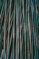 A very large pile of small bamboo, which will later be made into various crafts such as children's toys, straws, flutes, and others, the production process is done manually by local craftsmen