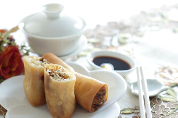 Chinese food, homemade spring roll dim sum served with rice