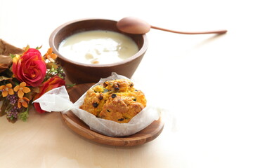 Homemade pumpkin scone and clam chowder for autumn breakfast 