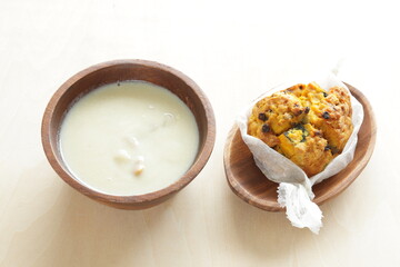 Homemade pumpkin scone and clam chowder for autumn breakfast 
