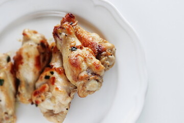 Homemade Chinese barbecue grilled spring onion marinated Chicken drumsticks
