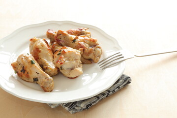 Homemade Chinese barbecue grilled spring onion marinated Chicken drumsticks