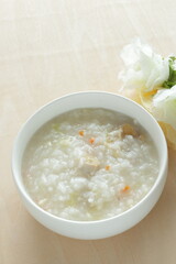 Homemade Chinese food, chicken and carrot congee for comfort food image