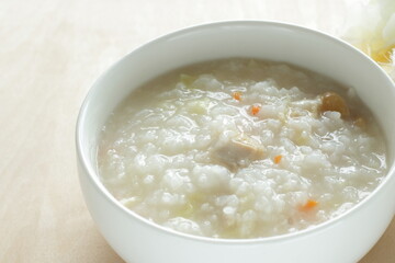 Homemade Chinese food, chicken and carrot congee for comfort food image