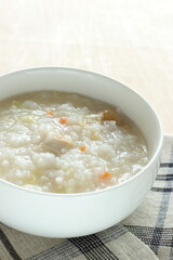 Homemade Chinese food, chicken and carrot congee for comfort food image