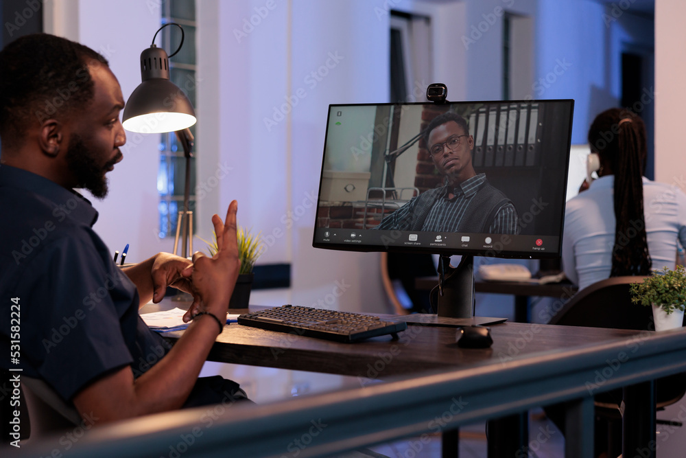 Poster office worker meeting with man on remote teleconference chat, using webcam and computer to have inte