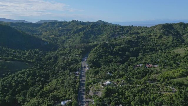 Driving On The Highway In The Town Of Altamira. Carretera Navarrete In Puerto Plata, Dominican Republic. aerial drone