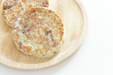 Japanese frozen food, okonomiyaki on wooden plate 