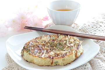 Japanese food, Okonomiyaki cabbage pancake with sauce and seaweed with mayonnaise