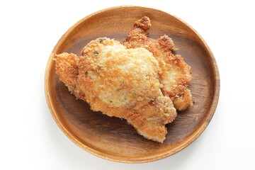 Homemade Japanese deep fried pork on wooden plate 