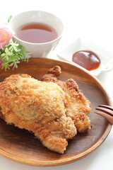 Homemade Japanese deep fried pork on wooden plate 