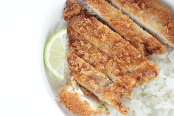 Japanese food, homemade pork cutlet on rice served with Lime