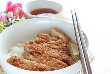 Japanese food, homemade pork cutlet on rice served with Lime