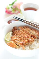 Japanese food, homemade pork cutlet on rice served with Lime