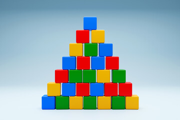 Pyramid built from children's cubes. Toy castle for children's play.  3D illustration.